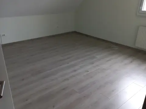 Pose de parquet à Kunheim